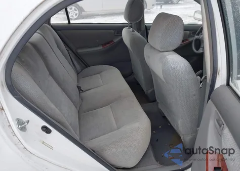 2003 Toyota Corolla Le z USA, uszkodzony, nr VIN JTDBR32E732015404